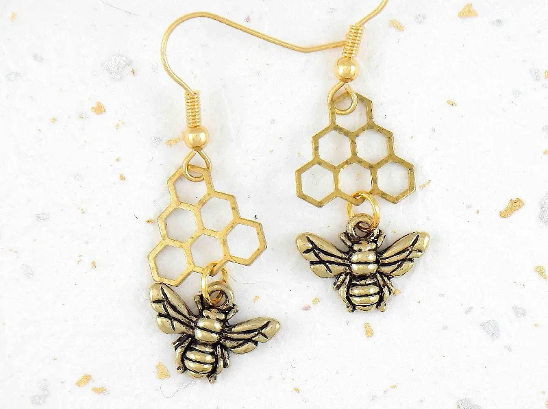 Long earrings with brass bees and honeycombs, gold-toned stainless steel hooks