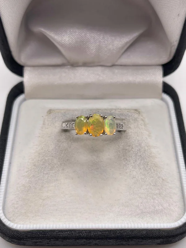 9ct white gold opal and diamond ring