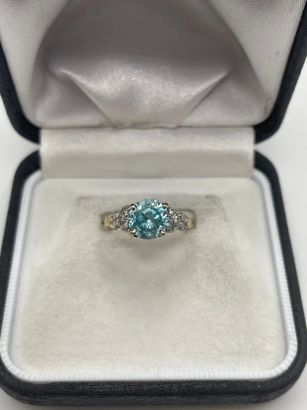 18ct gold blue zircon and diamond ring