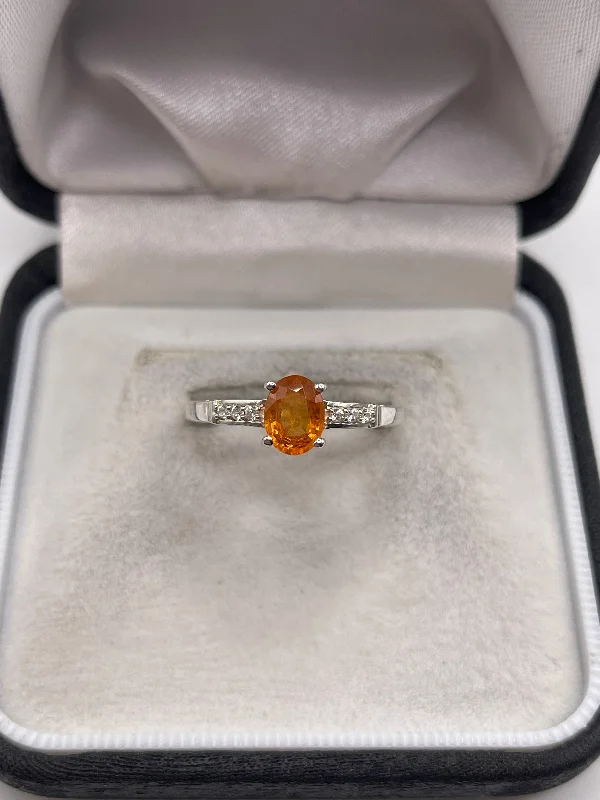 Silver orange sapphire ring